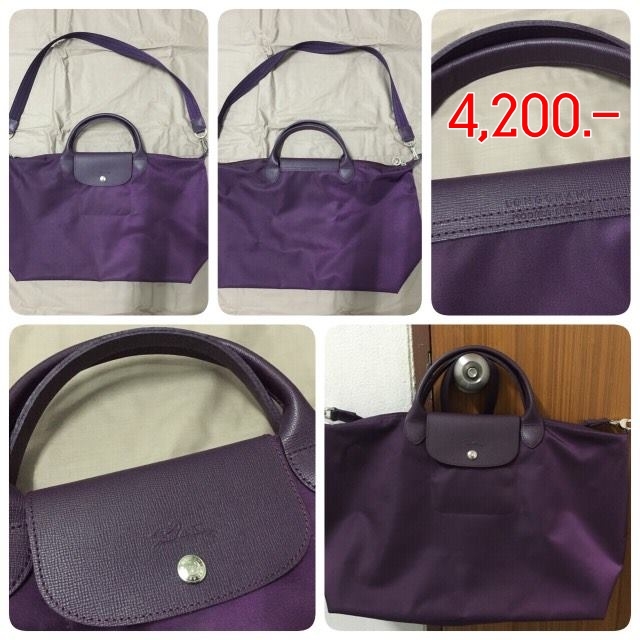 กระเป๋า Longchamp Le Pliage Neo ราคา : 4200 บาท ยี่ห้อ: Longchamp รหัสสินค้า : Le Pliage Neo สี Bilberry ขนาด : 40x31x18 cm Size L รายละเอียดเพิ่มเติม : กระเป๋าแบรนด์ Longchamp รุ่น Neo ไซส์ L สีม่วงเปลือกมังคุด หูสั้น เป็นสินค้าใหม่ไม่เคยผ่านการใช้งาน